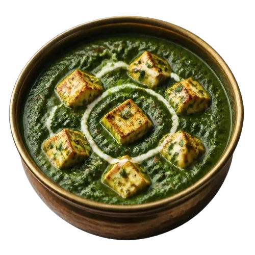 Bowl of palak paneer, grilled paneer cubes in spinach gravy